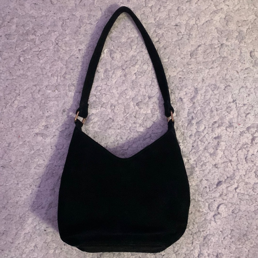 Brandy bag!! In between a tote and a mini bag, flat base stands up on surfaces!